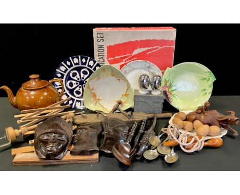 A Metacommunication telephone set, boxed; carved Chinese figure boy on a water buffalo;  others African tribal art;  Carltonw