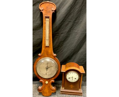 An Edwardian inlaid mahogany mantel clock, white dial, Arabic numerals, two winding holes, spiral strike movement, 32cm high,