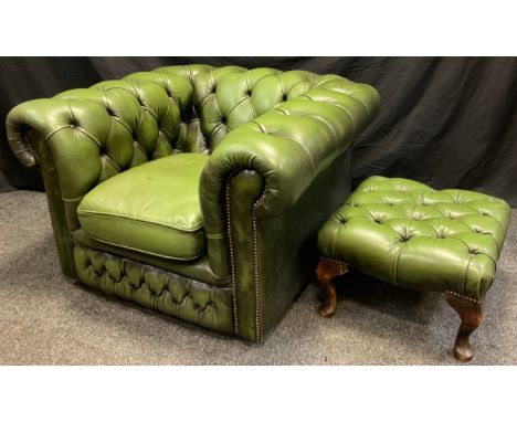 A Chesterfield Club chair, button back, scroll arms, green leather upholstery, 65cm tall (42cm to seat) x 90cm wide x 90cm de