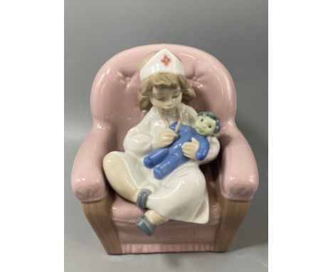 Nao by lladro figure little girl nurse in good condition 