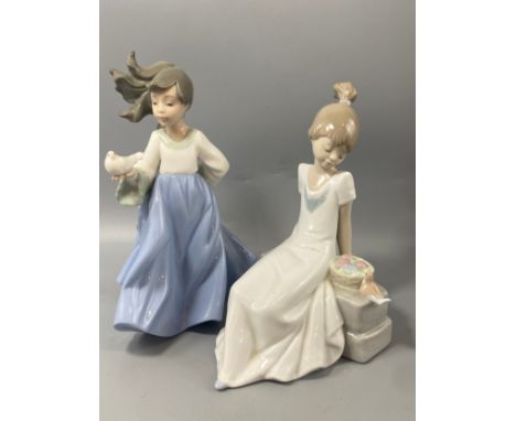 2x Nao by Lladro girl with bird figures both in good condition 