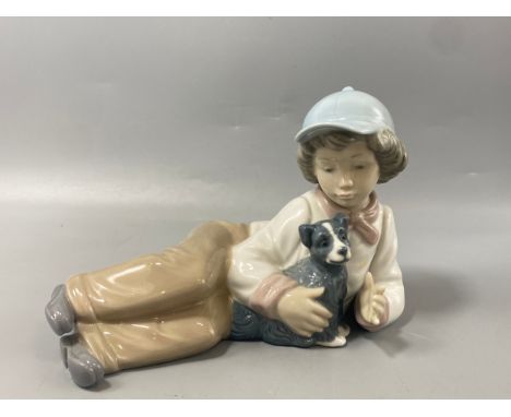 Nao by lladro figure 1149 Boy with Dog in good condition with original box 