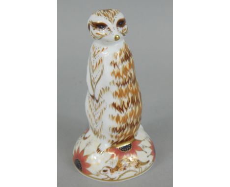 A Royal Crown Derby porcelain meerkat paperweight, printed marks in red and gold, button to underside