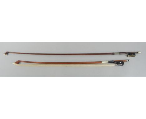Two violin bows, each with silver coloured metal and mother of pearl mounts
