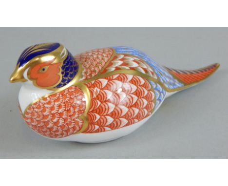 A Royal Crown Derby porcelain pheasant, printed mark in red to underside and gold button