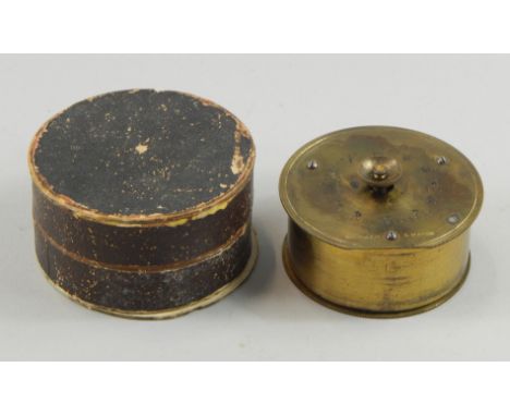 A brass alarm clock, stamped to the top W Penn Paris, and to the reverse Brevete, and a cockerel emblem, numbered 36487, in o