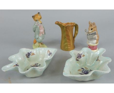 A collection of items, to include a Royal Worcester gold decorated leaf jug, two Beswick Beatrix Potter figures and two leaf 