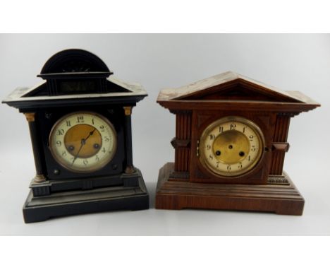 Two similar German mantel clocks, each of portico form, with white enamel type dial and Arabic numerals, the tallest 40cm hig