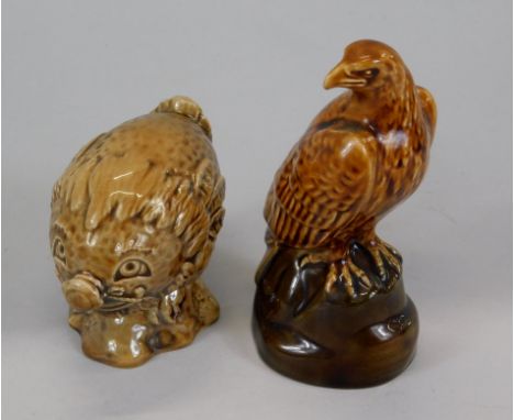 Two Beneagles Scotch Whisky decanters, in the form of an eagle and a puffer fish (both sealed)