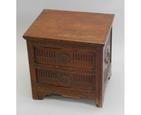An 18thC mahogany box commode, the hinged lid revealing a vacant interior, the sides later carved with patera, flutes, etc, 4