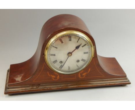 An Edwardian marquetry mantel clock, with silvered dial, on bun feet, 41cm wide