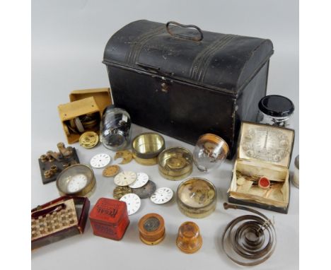 A large quantity of clock maker's parts, some tools etC, and a Victorian black painted tin domed small trunk (AF)