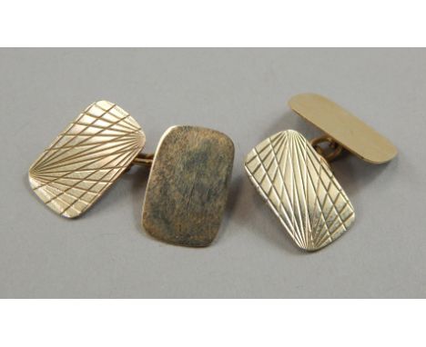 A pair of 9ct gold cufflinks, with engine turned design, 3.8g all in. 