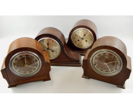Four mantel clocks, to include an Edwardian Napoleon's hat type example, a similar oak clock etC