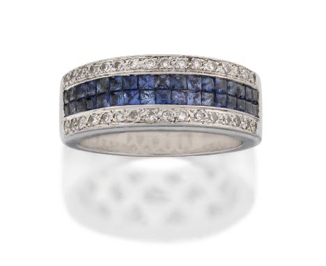 two rows of calibré cut sapphires flanked by rows of eight-cut diamonds, in white pavé and claw settings, to a plain polished