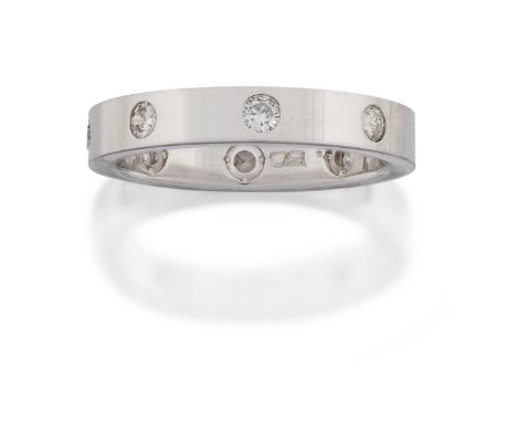the plain polished band inset with eight round brilliant cut diamonds, total estimated diamond weight 0.45 carat approximatel