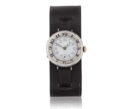 manual wound lever movement, enamel dial with Arabic numerals, seconds dial, bezel with blue enamel Arabic numerals, wire lug
