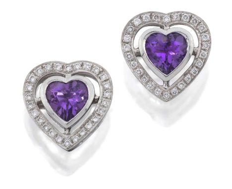 the heart shaped amethyst in a rubbed over setting, to a spaced border of eight-cut diamonds, in claw and channel settings, t