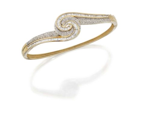the swirl motif set throughout with eight-cut diamonds in white pavé settings and baguette cut diamonds in yellow channel set