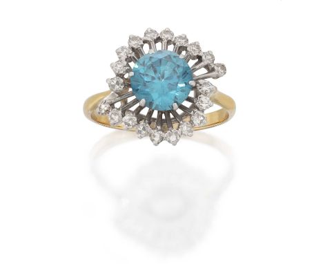 the round cut blue zircon within a radial border of tapered bars terminating to eight-cut diamonds, in white claw settings, t