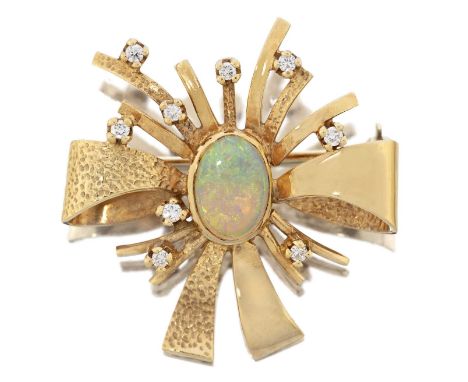 modelled as a stylised bow, with an oval cabochon opal to the centre in a yellow rubbed over setting, to plain polished and t