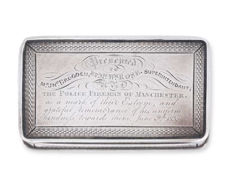 oblong, the base and side each engine-turned, the hinged cover engraved with an inscription within engine-turned border69mm w
