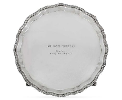 shaped circular and with Celtic motif cast border, on four scroll feet, engraved with an inscription25.5cm diameter, 16oz 16d