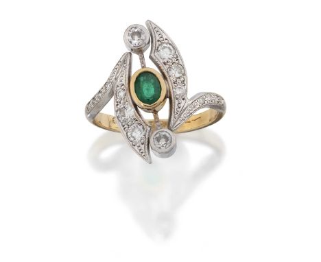 the oval cut emerald in a yellow rubbed over setting, flanked by round brilliant cut diamonds in white rubbed over settings s