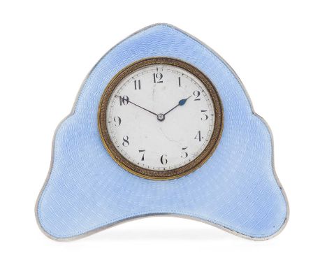 shaped oblong and with easel back, the front of the mount with light blue guilloche enamel, with brass easel back, the timepi