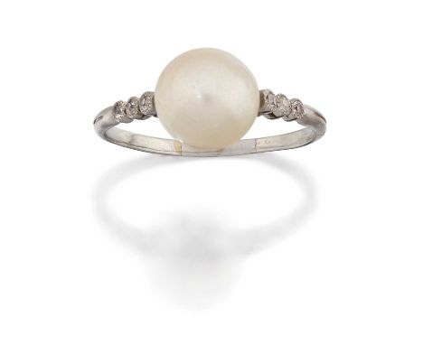 the pearl flanked by trios of old cut diamonds, in white millegrain settings, to a plain polished shank, total estimated diam