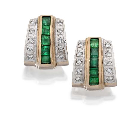 the emerald-cut emerald in a yellow claw setting, to a plain polished surround, surmounted by a trio of round brilliant cut d