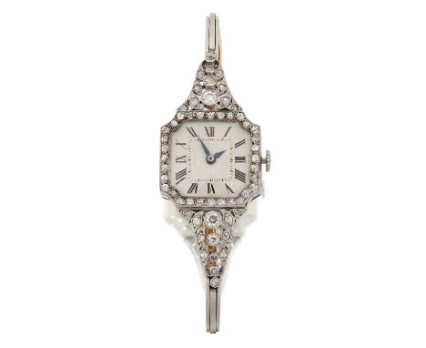 manual wound lever movement, silvered dial with Roman numerals, old cut and eight-cut diamond set bezel and hinged lugs, in w