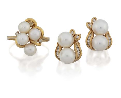 four cultured pearls spaced by yellow plain polished scrolls and eight-cut diamonds, to a tapered shoulder plain polished sha