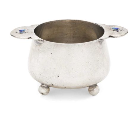 in the Art Nouveau style, tapering oval and on four ball feet, with spatulate handles, each heightened with blue enamel68mm w