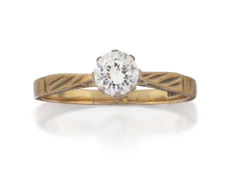 the round brilliant cut diamond in a white claw setting, to a yellow textured shoulder plain polished shank, estimated diamon