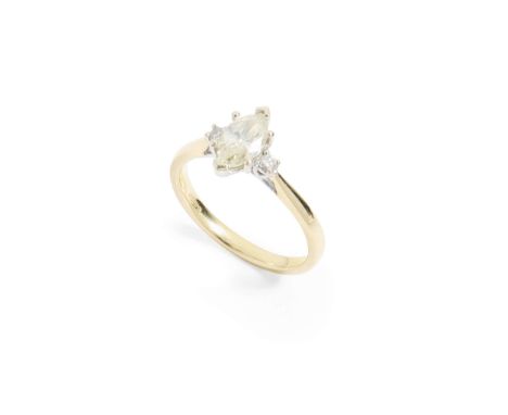  An 18ct gold diamond three-stone ring  Claw-set with a light yellow marquise-cut diamond and two small round brilliant-cut d