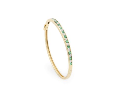  An emerald and diamond bangle  Of hinged design, the front channel-set with alternating square step-cut emeralds and round b