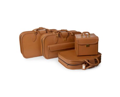  Ferrari 456GT Schedoni Tan Leather Luggage Set  Including two large and one small suitcase and a vanity case, with green dus