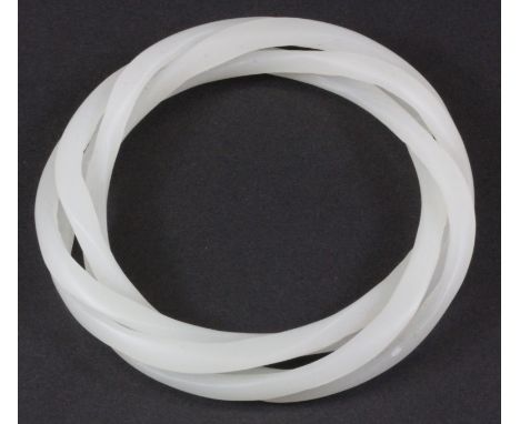 A rare carved white jade triple interlocking bangle, Dia. 6cm.