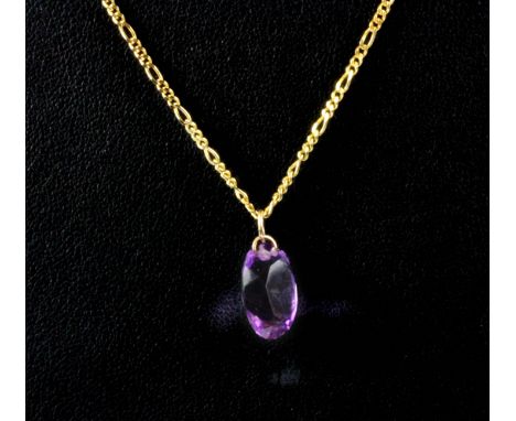 A 9ct yellow gold amethyst set pendant and chain.