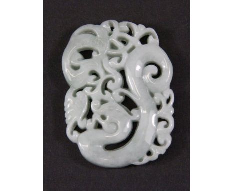 A finely carved jadeite jade dragon pendant, H. 5cm.