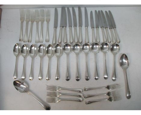 A Victorian and later matched canteen of Old English and bead pattern cutlery and flatware, comprising of six table forks by 