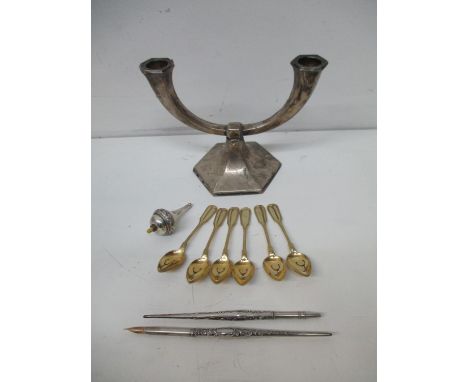 Mixed white metal items to include six gilt coffee spoons, an electric bell push with an ivory button, a twin branch candlest