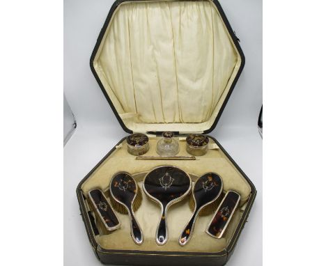 An early 20th century tortoiseshell and silver dressing table set with pique decoration, by William Vale &amp; Son, Chester 1