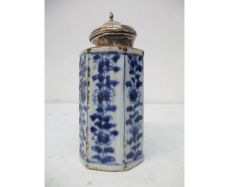An 18th century Chinese tea caddy of rectangular form with canted corners decorated with flowers and foliage in tones of blue