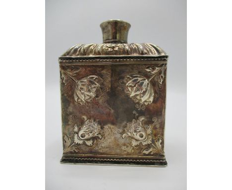 A 19th century white metal tea caddy bearing the Dutch import mark for 1814-1893 to the lid and neck, having embossed floral 