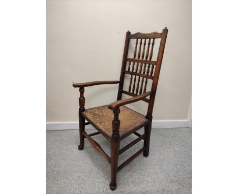 19th century oak rushwork Lancashire chair, with bobbin turned spindle back supports, raised on pad feet, height 107cm. 