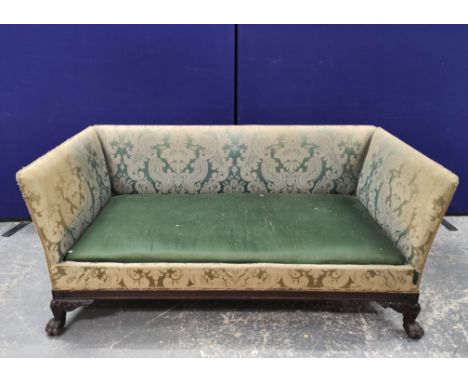 Regency style sofa, upholstered in a pale green floral damask, on carved mahogany hairy paw feet, 69cm high, 168cm wide.Condi