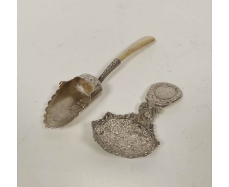Silver caddy spoon with octagonal embossed bowl and oval grip by Joseph Taylor 1823 and another with shaped bowl and pearl ha