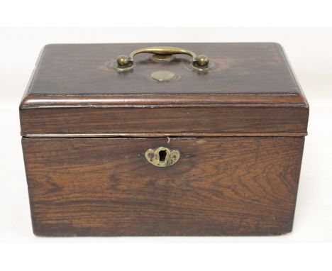 Georgian rosewood tea caddy of rectangular form with single brass swing handle, inlaid brass roundels and escutcheon, the int